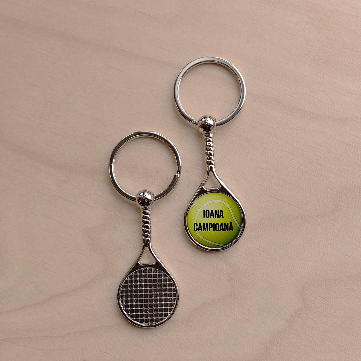 Sleutelhanger in de vorm van een tennisracket, gepersonaliseerd met tekst - Kampioen
