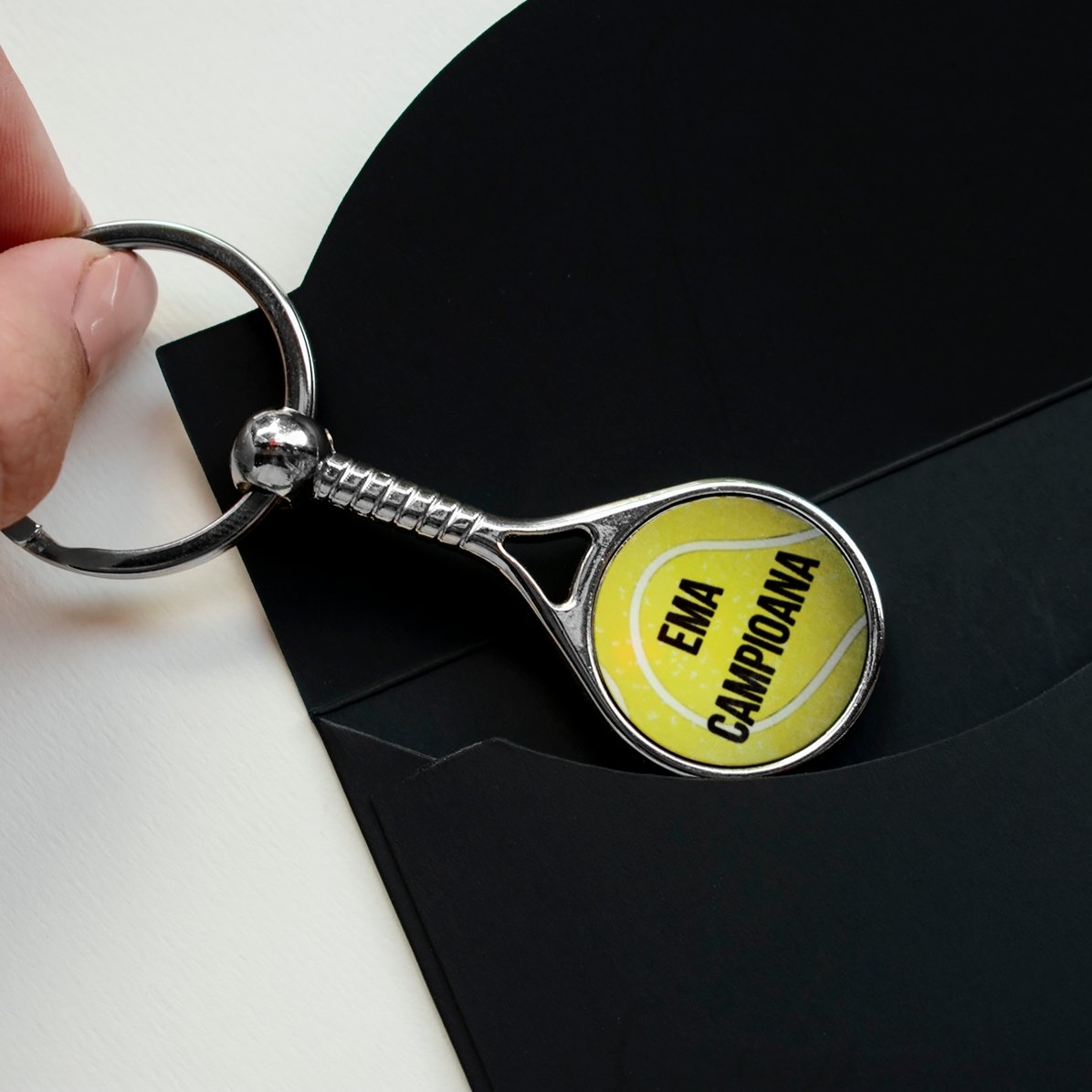 Sleutelhanger in de vorm van een tennisracket, gepersonaliseerd met tekst - Kampioen