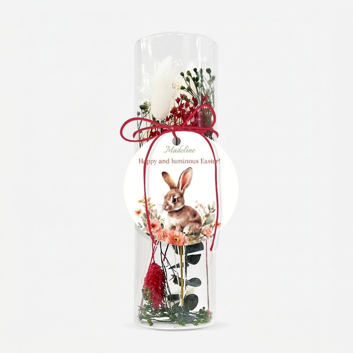 Décoration en verre avec des fleurs stabilisées, personnalisée avec le message « Joyeuses Pâques ! »