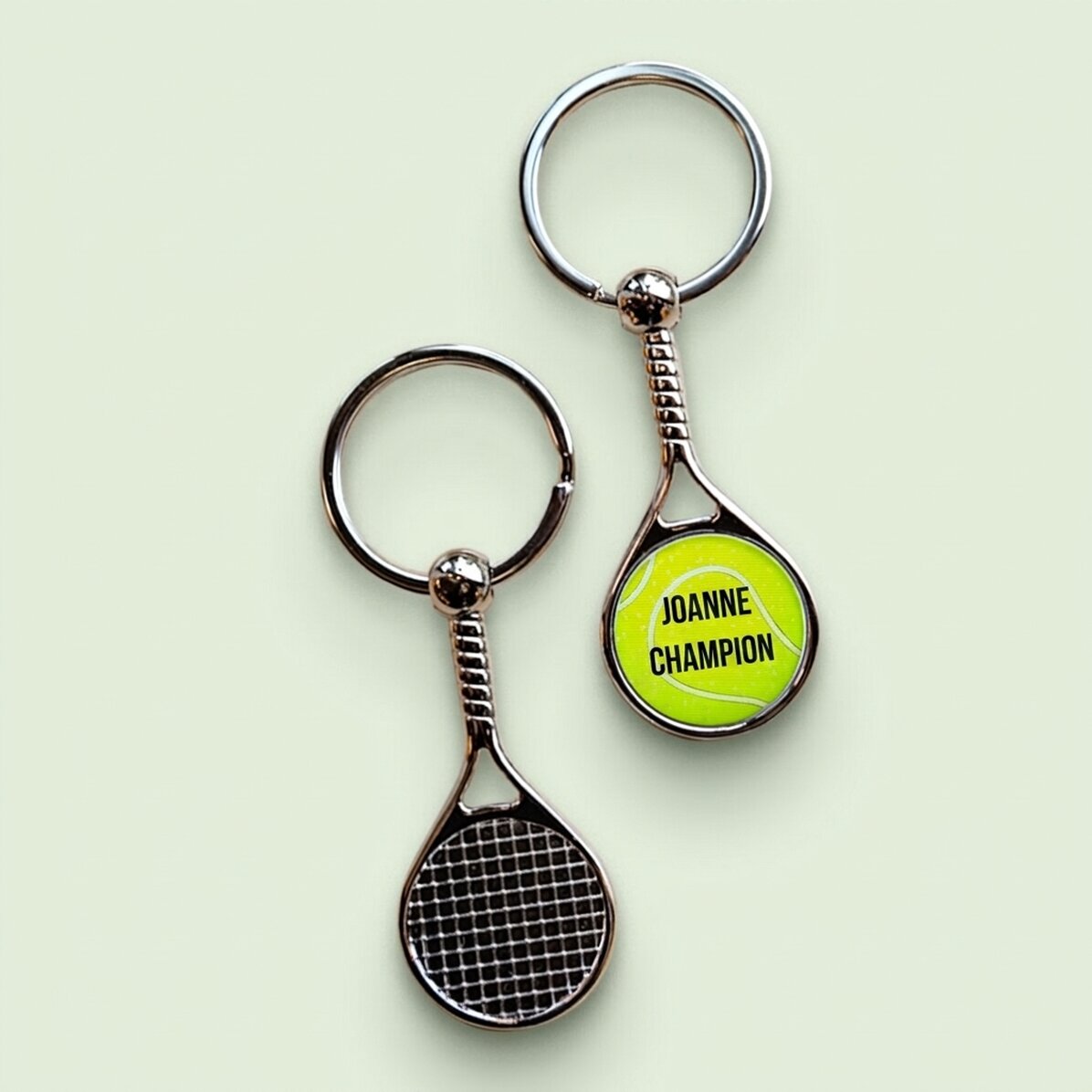 Sleutelhanger in de vorm van een tennisracket, gepersonaliseerd met tekst - Kampioen